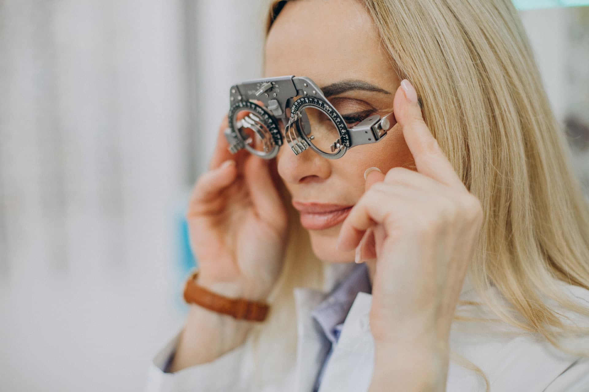 Eye care professional measuring a patient's sight